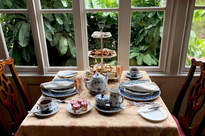 Afternoon Tea at Graycliff Hotel - The tiered plate: sandwiches, scones with clotted cream, and petit fours