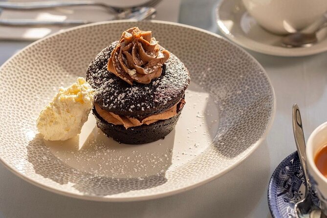 Afternoon Tea with Castle Views in Edinburgh - The guide’s job: tea history in Scotland, told with warmth