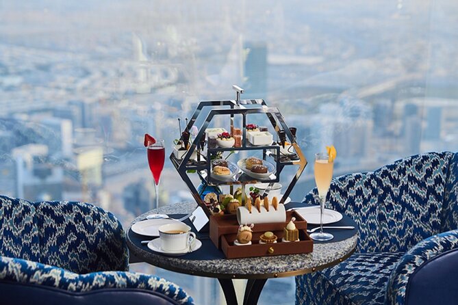 Atmosphere Burj Khalifa High Tea Experience with Private Transfer - What you eat and drink: sweet, savory, and unlimited non-alcoholic drinks