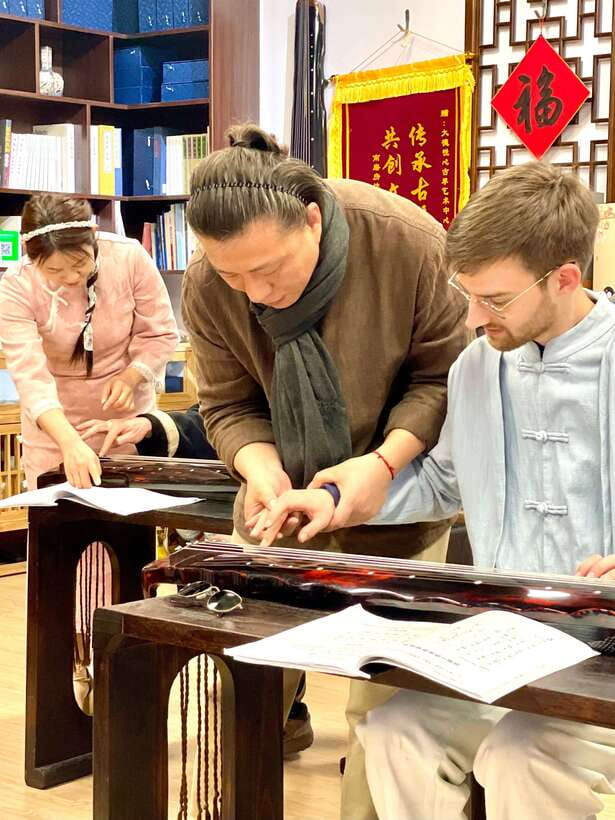 Beijing Culture Event: Tea Ceremony, Music Show, Calligraphy - Private tea base and Guqin center access in Beijing