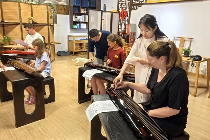 Beijing Culture: Tea Ceremony, Heritage Instrument & Calligraphy - Guqin in Your Hands: Learning the Melody, Not Just Watching Fingers