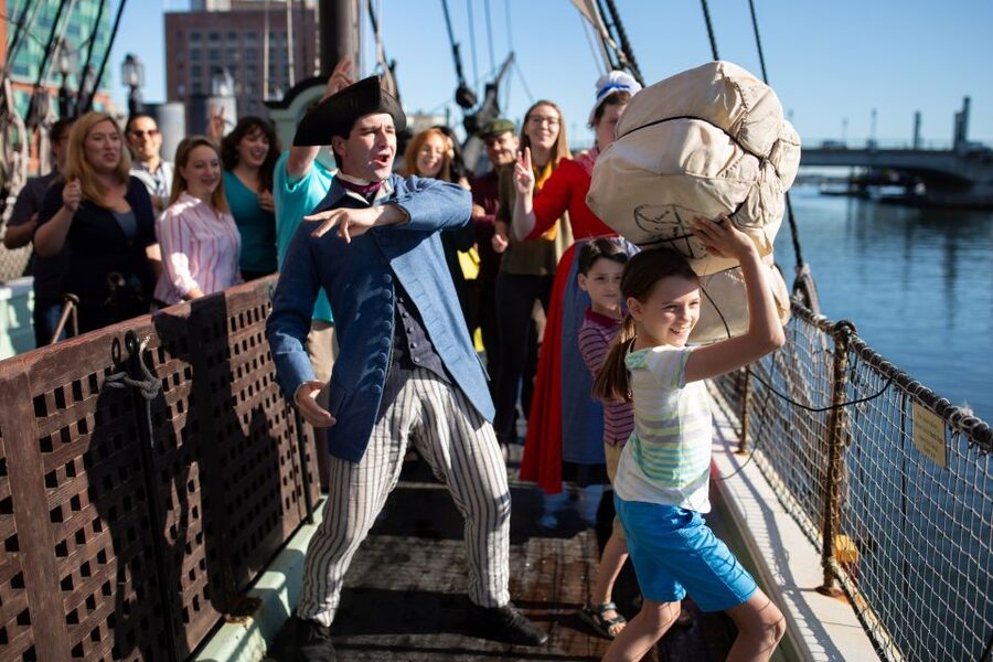 Boston: Boston Tea Party Ships and Museum Interactive Tour - The meeting house: your handbill, mohawk disguise, and your role in 1773