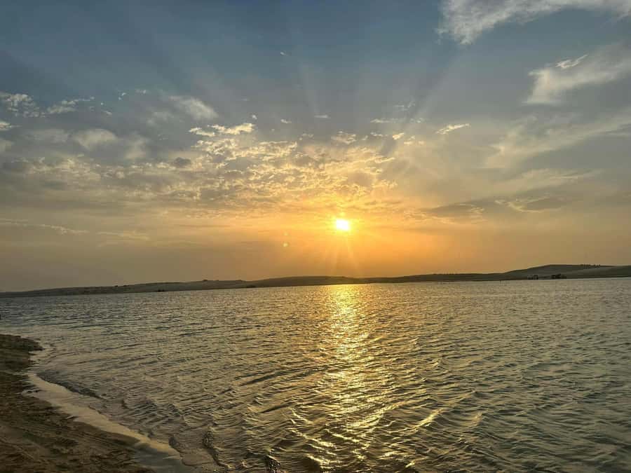 Doha: Sunset desert tour with Camel Ride, Inland Sea & Tea - Mesaieed Camel Ride: A Quick Experience, Not a Long Stroll