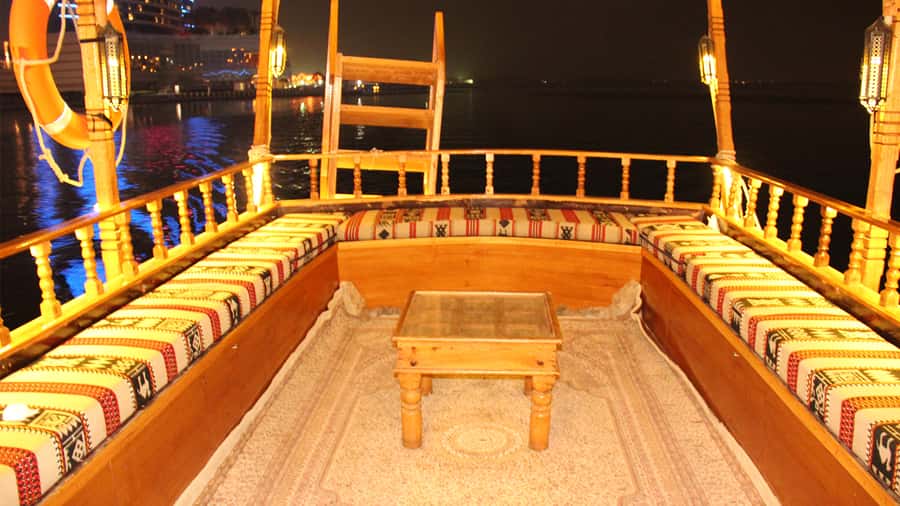 Dubai: Sunset Cruise on Traditional Boat & Emirati High Tea - Listening to Arabic music and getting the commentary right