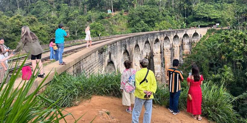 Ella: Tea Factory, Train, and Nine Arch Day Tour with Pickup - Ravana Waterfall: loud power, lush surroundings, easy photos