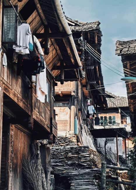 Guilin Longji: Rice Terrace with Oil-Tea Demo & Zhuang Lunch - Guzhuang Village: costumes, tools, and a calmer pace at the base of the terraces