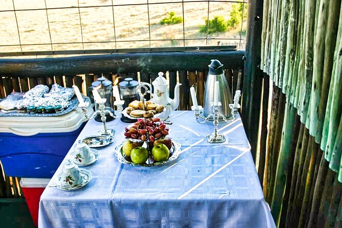 High Tea in the Savannah, Catering by Victoria Falls Hotel - Parking at the waterhole: where the tea becomes the safari highlight