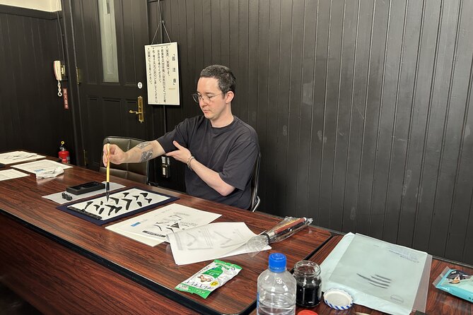Japanese Calligraphy Class in Yokohama with Tea and Sweets - Yokohama’s Port Opening setting: Jack’s Tower calm focus