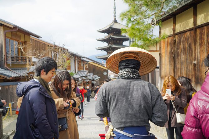 Kyoto Tea Ceremony & Kiyomizu-dera Temple Walking Tour - Pass the Kiyomizu-zaka pilgrimage route: shopping streets, signage, and the “how it works” explanation