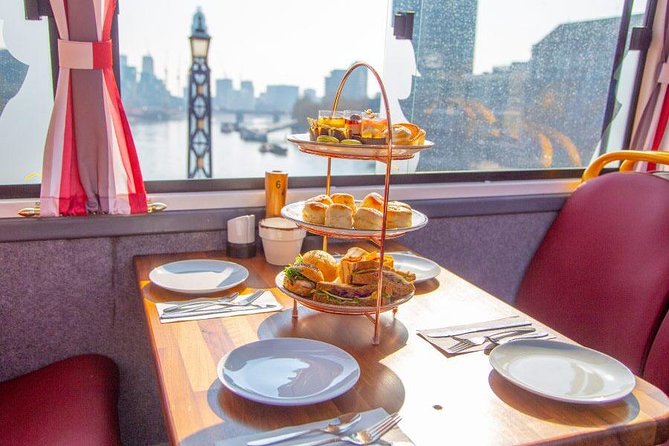 London Afternoon Tea Bus and Panoramic Tour on Lower Deck - The big catch: no live guide, and the audio/music can matter