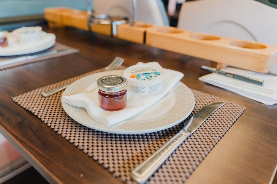 London: Afternoon Tea Bus with a Glass of Prosecco - What’s on your tray: sandwiches, scones, mini desserts, and cakes