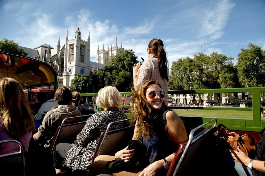 London Vintage Bus Tour and Cream Tea at Harrods - A Thames cruise that turns the city into a moving panorama
