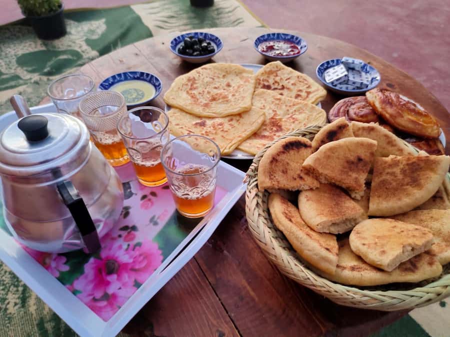 Marrakech: Guided Quad Bike and Camel Ride Tour with Tea - Camel Ride Break: Traditional Clothing and a Slower Pace