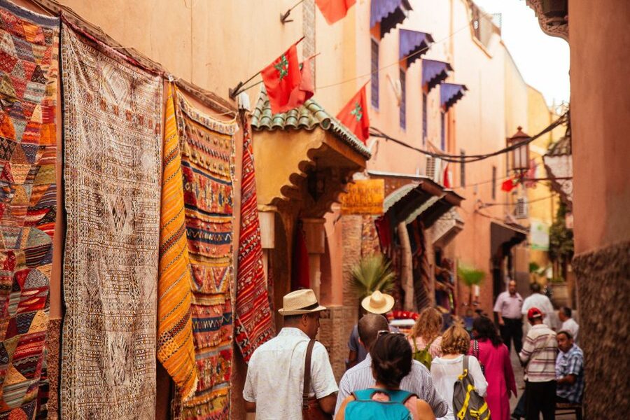 Marrakech: Private Souks Tour with Tea and Traditional Snack - Watching Artisans Work: Tile, Slippers, Carpets, Ceramics, and More