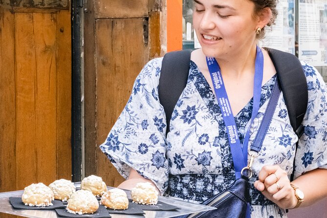 Montmartre Hill French Afternoon Tea Tasting Tour with Crepes and Macarons - Place du Tertre: Where Artists’ Energy Still Lingers