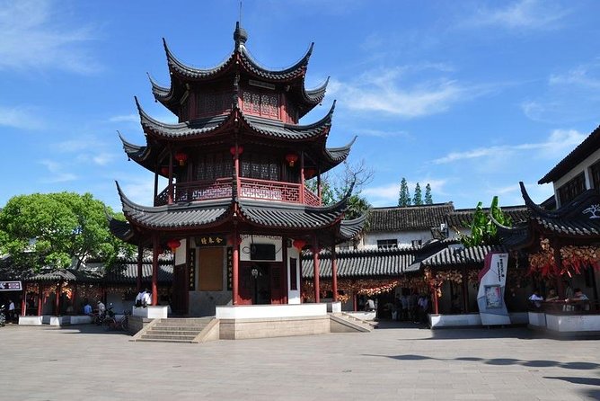 Private Qibao Ancient Town Walking Tour with Tea Tasting and Calligraphy Experience - Qibao is the kind of day trip that needs context