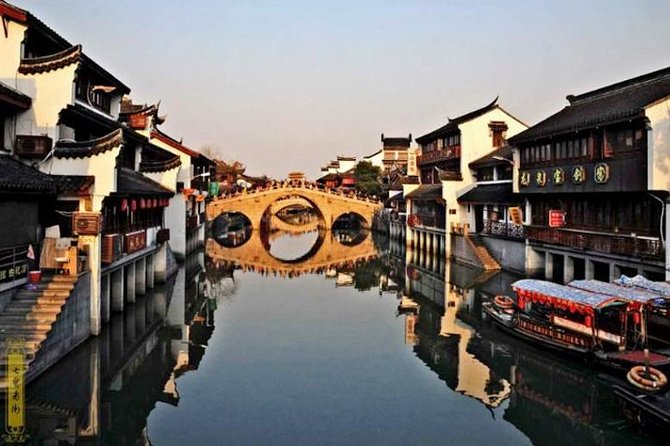 Private Qibao Ancient Town Walking Tour with Tea Tasting and Calligraphy Experience - Price and logistics for a 5–6 hour private day