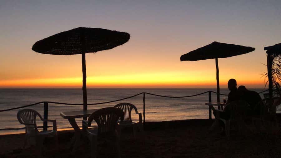 Tangier: Sunset, Tea, Sweets, Camel Ride, and Hercules Caves - Camel ride on the beach at sunset: fun, photos, and real time
