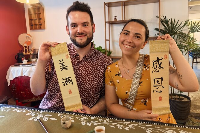 Xi'an Calligraphy & Tea Ceremony - Dive into Ink & Brush Artistry - The Character Wall: Seeing 3,000 Years of Writing Change